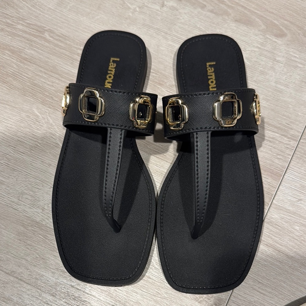 Larroude Black and Gold Sandals with Elegant gold metal floral Design